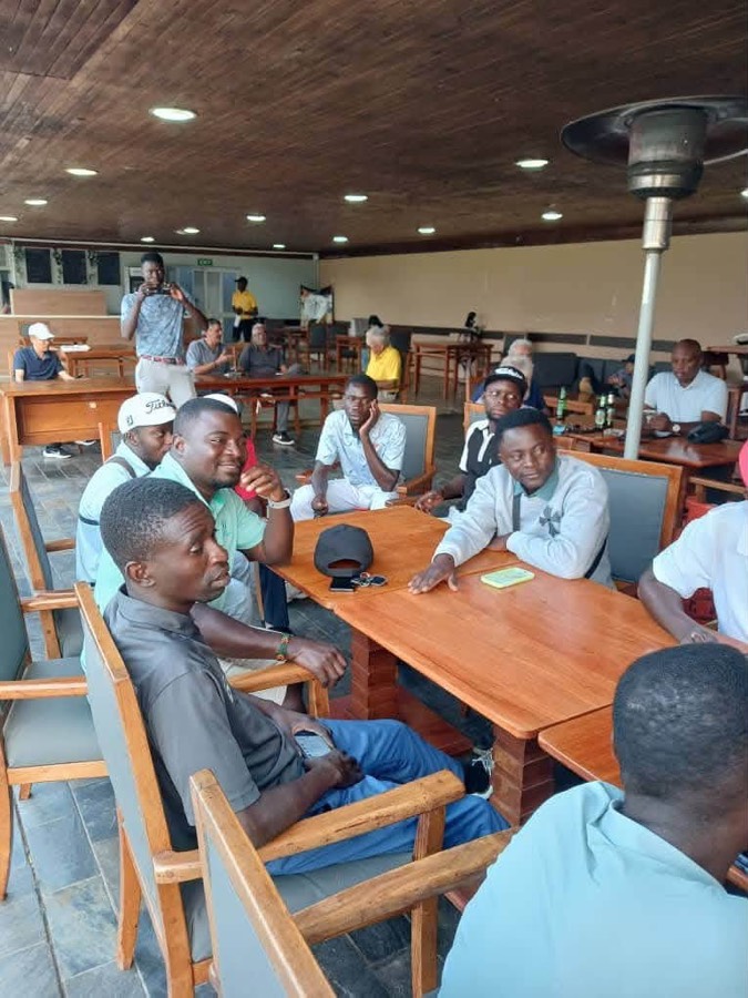Players gathered in the clubhouse after a round
