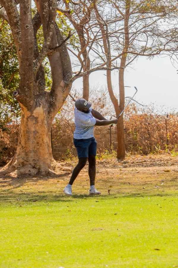A golfer on the fairway during a Bogey Free round