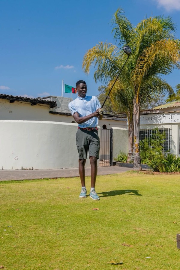 A golfer on the fairway during a Bogey Free round