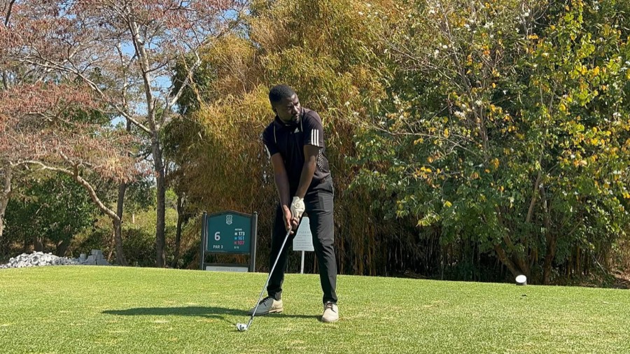 A golfer on the fairway during a Bogey Free round
